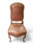 A French style child's chair with brown leather se