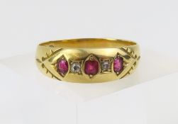 A late 19th century 18ct gold set with three square facetted cut ru