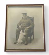 A print of a WWI soldier sat on a chair with a ter