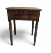 A small mahogany table with two short drawers and