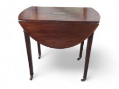 A Regency style mahogany drop leaf table, with rou