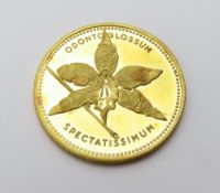 A Venezuelan gold commemorative private mint coin,