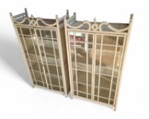 A pair of wooden cabinets