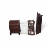 A collection of mixed furniture, including a short
