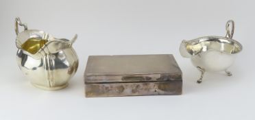 A silver sauce boat, made by the Levesley Brothers