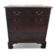 A mahogany and stained chest of four long