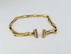 A watch bracelet with rectangular spring links, ma