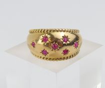 A mid-20th century bombe style ring, the front set