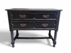 A small ebonised oak sideboard