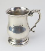 A silver christening mug