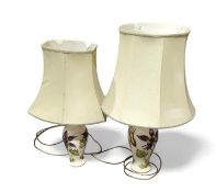 A near pair of Moorcroft lamps with shades. Of dif