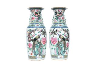 A pair of Chinese famille rose vases with phoenix and parrots, 19th C.