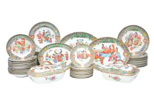 An extensive Chinese Canton famille rose service with monogram medallions, 19th C.