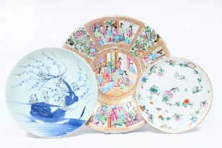 Three Chinese famille rose and blue, white and copper-red dishes, 19th C.