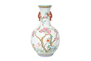 A Chinese famille rose 'pomegranates' vase, Daoguang mark, 20th C.