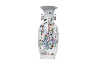 A Chinese famille rose vase with ladies and children playing in a garden, 19th/20th C.