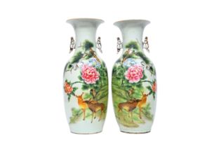 A pair of Chinese famille rose 'deer and cranes in a landscape' vases, 20th C.