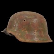 WWII Nazi German M42 Combat Helmet. The helmet shows signs of wear.