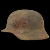 Rare WWII Nazi German M35 Helmet, Camouflage paint, with liner and chin strap.