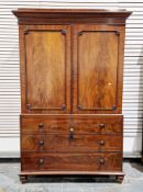 19th century mahogany caddy top linen press, the two moulded panel doors opening to four pull-out