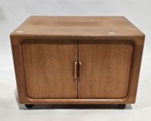 Mid-century teak media cabinet with sliding tambour door, on castors, 55cm high x 80cm wide x 53cm