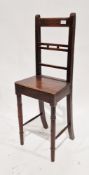 19th century oak child's correction chair, with square open back and solid seat, 90cm high