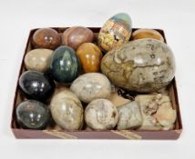 Collection of eleven carved and polished agate eggs, largest being 12cm high together with a