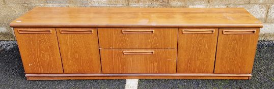 Mid-century retro Meredew teak low sideboard, comprising two central drawers flanked either side