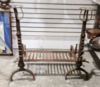 Late 19th/early 20th century cast and wrought iron firegrate in the Gothic style, with two