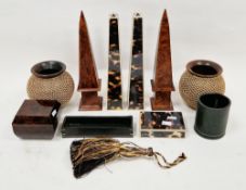 Collection of simulated tortoiseshell and burrwood desk obelisks, two tribal-style rattan covered