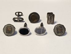 Collection of designer cufflinks including Hermes single silver cufflink, Tiffany & Co single 18k on