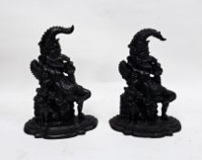 Pair of black painted cast iron doorstops in the form of Mr Punch (2)