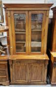 Victorian glazed library bookcase, the moulded cornice over two glazed doors with moulded edge