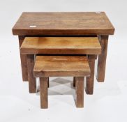 Oak nest of three rectangular tables, each on thick square splayed legs, largest 40cm high x 60cm
