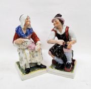 Pair of Staffordshire pottery figures of a cobbler and companion, late 19th/early 20th century, each