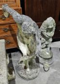 Composite stone garden statue of Discobolus of Myron, on an oval base, 93cm high together with a