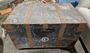Large iron bound wooden travelling trunk, the hinged lid opening to a metal lining, with carrying