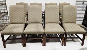 Set of 10 reproduction dining chairs, the fabric upholstery with riveted details, raised on