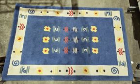 Modern Chinese superwash Cameo hand crafted blue ground rug with three rows of six geometric shapes,
