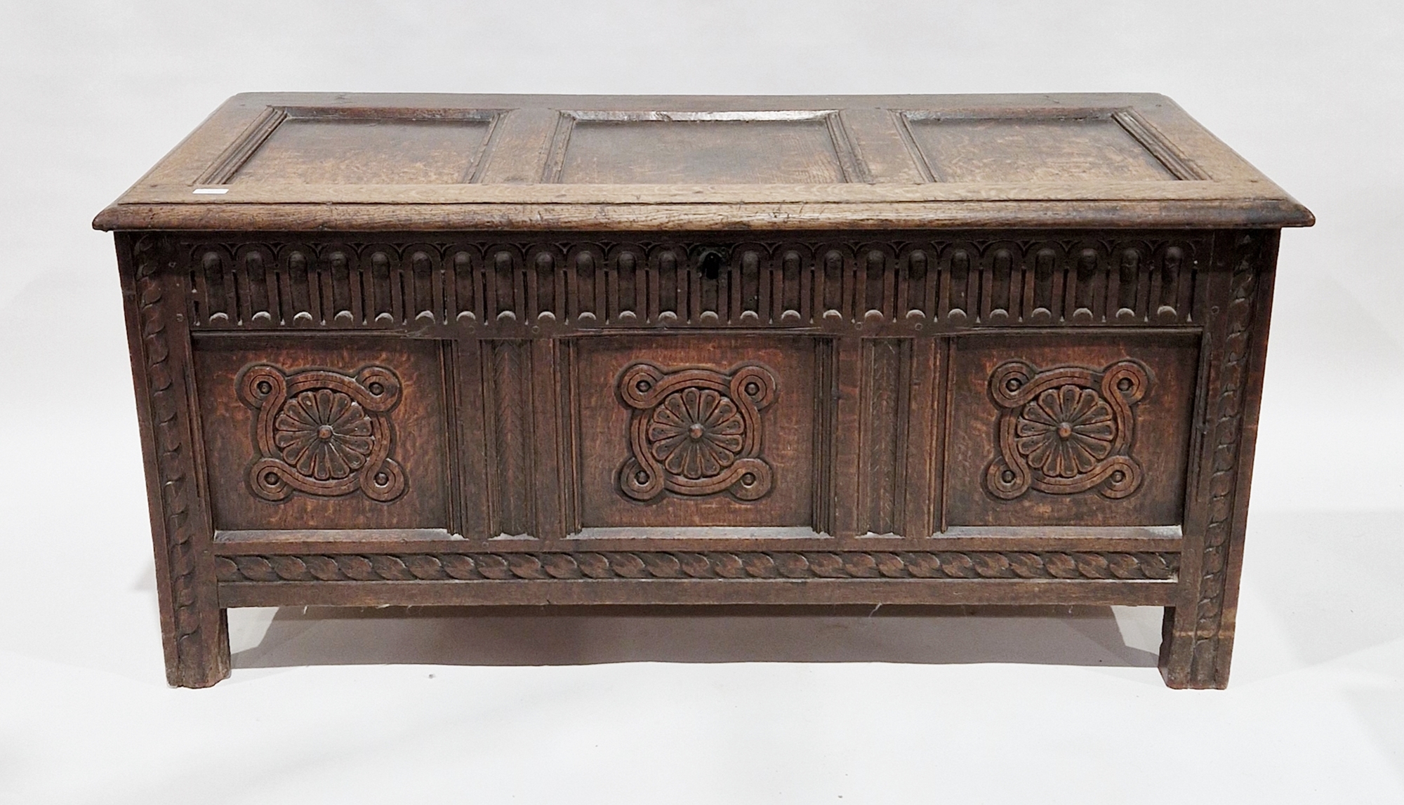 18th / 19th century oak three-panel coffer, the front frieze with nulling carving and the panels