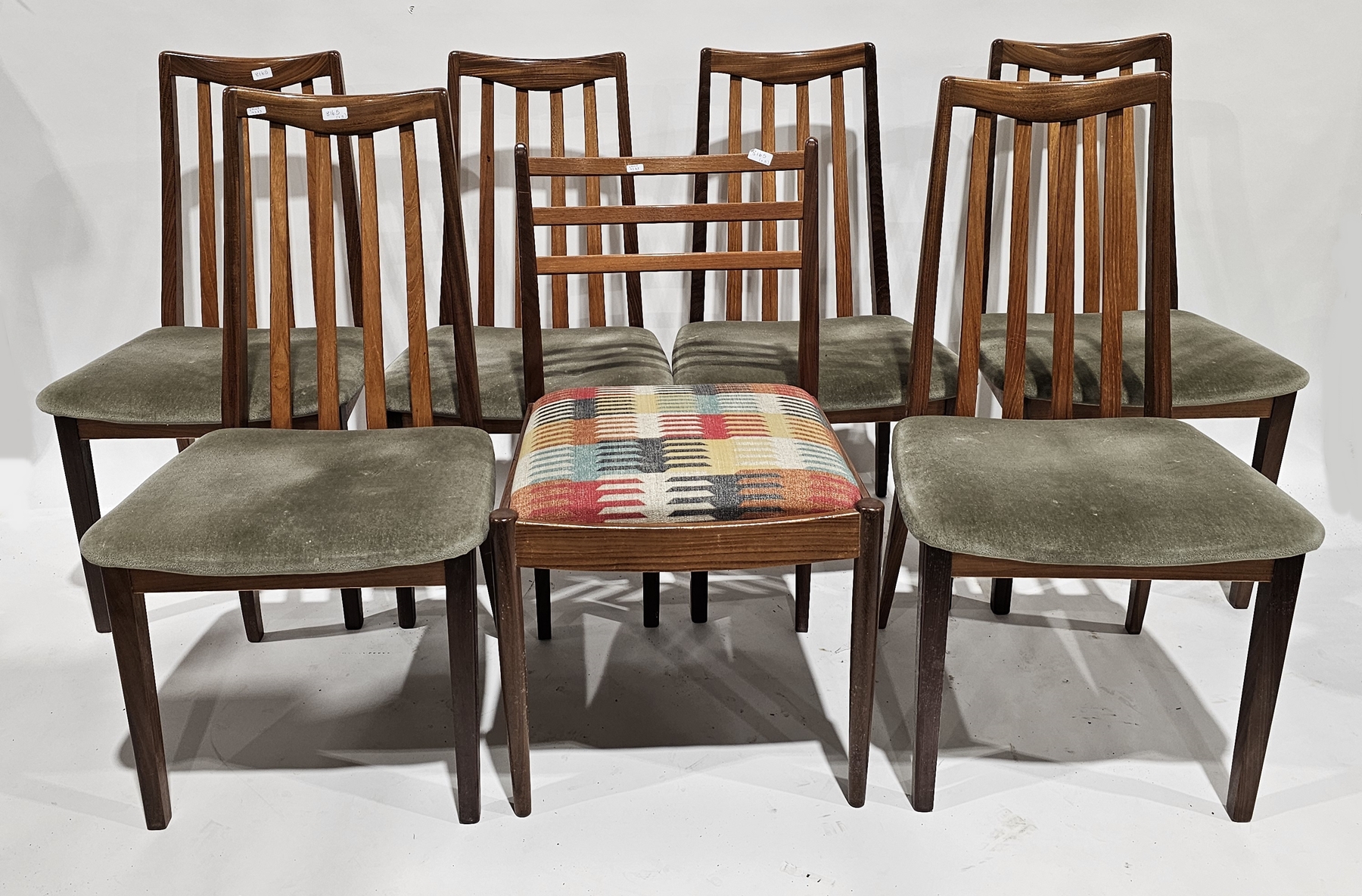 Set of six mid-century teak G-Plan 'Fresco' dining chairs, with green upholstered seats, labelled to