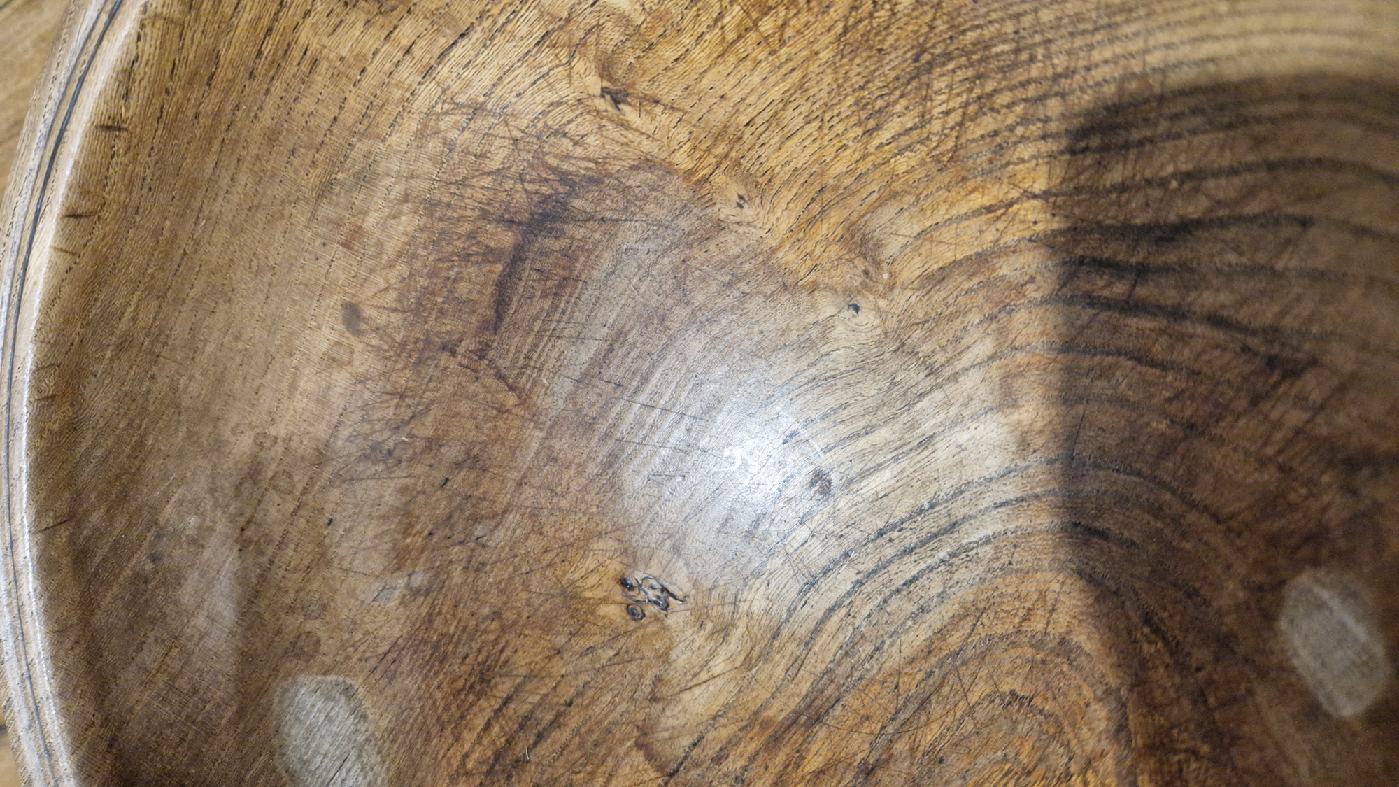 Two treen elm bowls in sizes, each turned, the first 19th/early 20th century (with repair to - Image 12 of 16