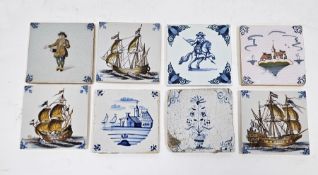 Collection of eight Dutch Delft polychrome and blue and white tiles including an 18th century