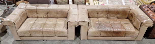 Pair of buttoned pale brown leather two seater sofas in the manner of De Sede of Switzerland,