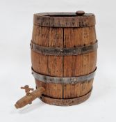 Early 20th century oak and iron bound coopered barrel or keg with wooden tap, 34cm high