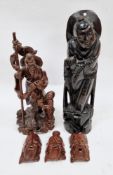 Chinese carved hardwood figure of an elder with silvered wire inlay, 36cm high together with a