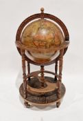 20th century Italian style terrestrial globe cocktail cabinet, the hinged lid opening to a fitted