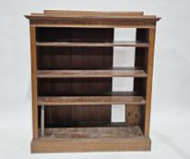 Early 20th century oak library bookcase, with three adjustable shelves, on plinth base, 136cm high x