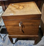 Georgian mahogany cellarette of square form, with inlaid marquetry conch shell to the lid, opening