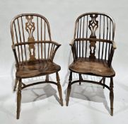 Two similar elm seated and ash Windsor hoop and comb-back elbow chairs, each with shaped pierced